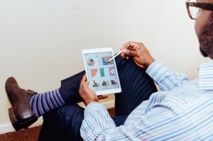 Man Looking at Charts